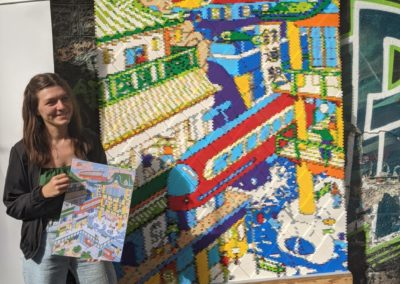 L'illustratrice Gessica Maio & la fresque en Lego Freelug